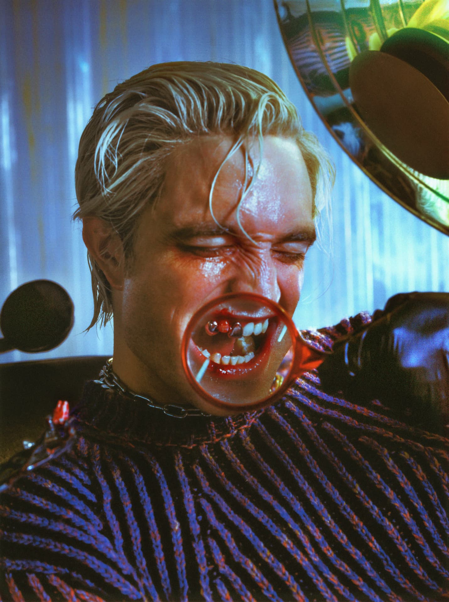 Rob Pattinson GQ — zebra print jacket with red tones