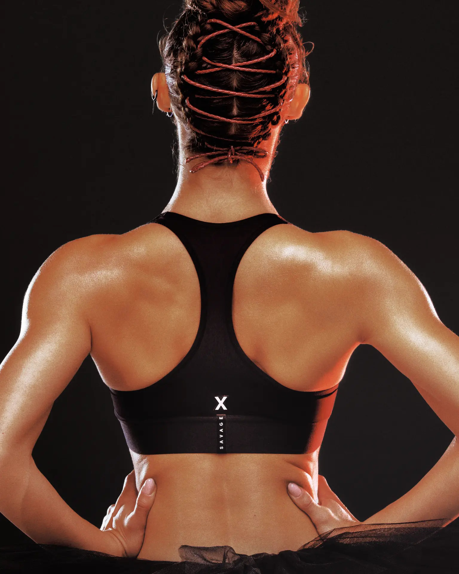 Savage x Fenty — back view of shoulders with braided hair