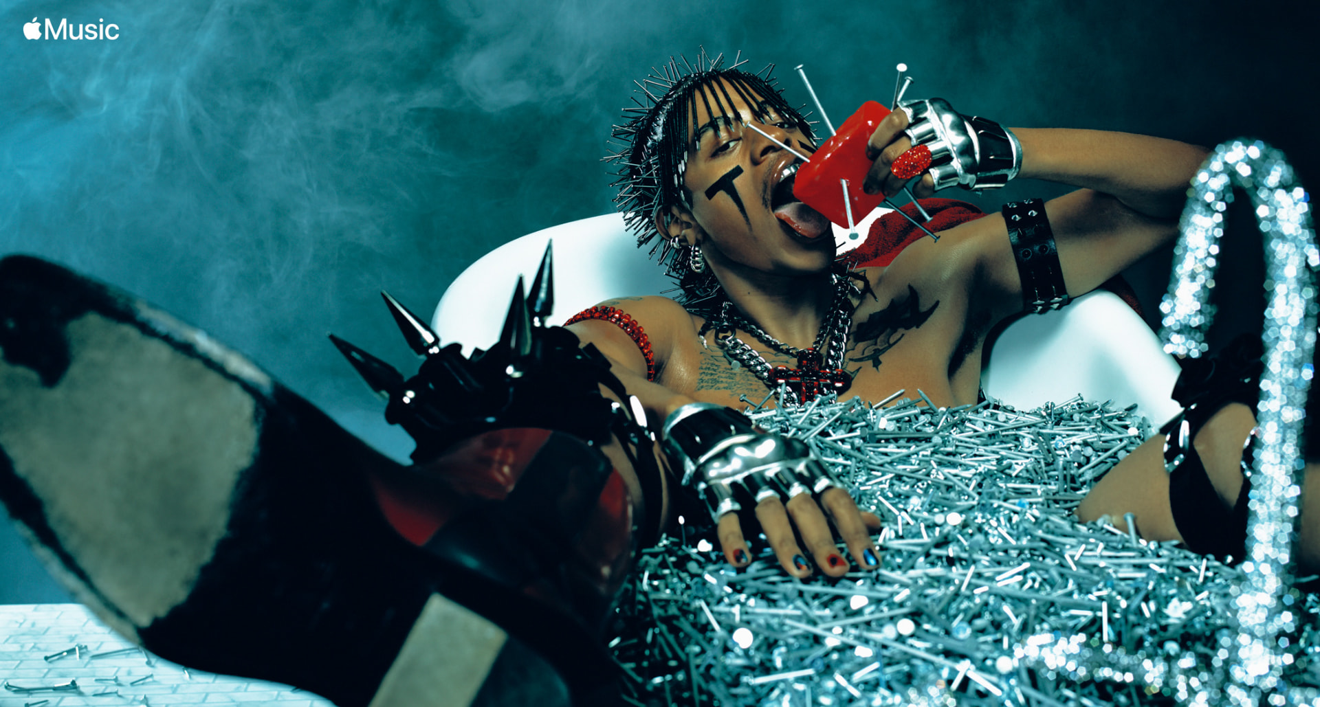 Teezo Touchdown — Apple Music bathtub portrait surrounded by nails and screws