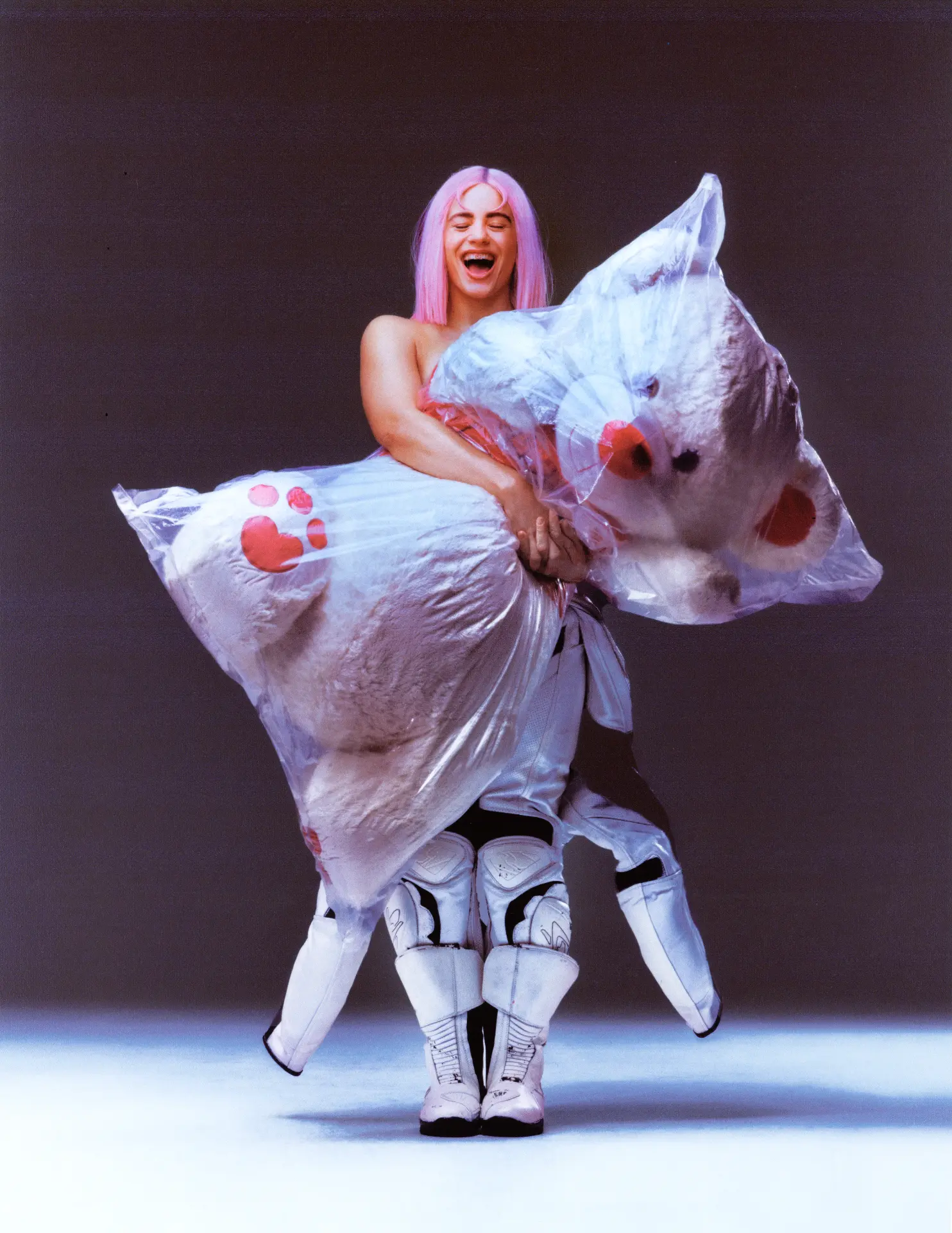 ROSALIA x GQ Cover Story — full-length portrait on an inflatable horse costume