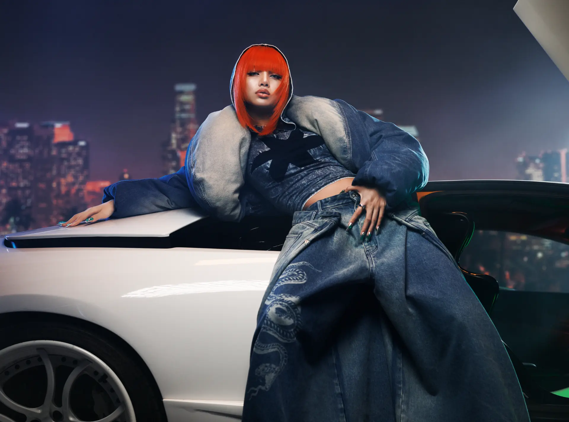 Lalisa — red-haired figure in denim on white car at night