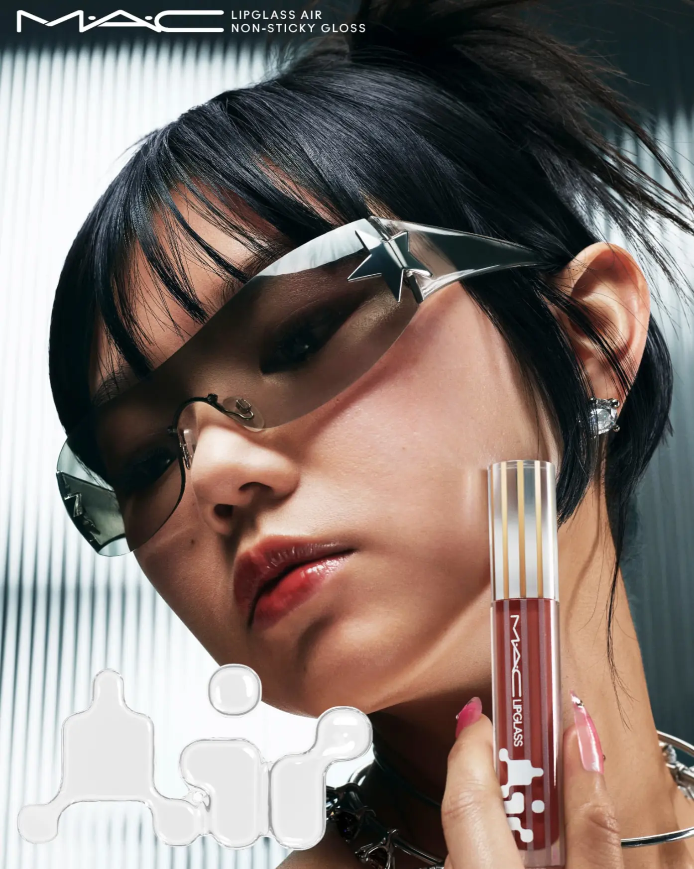 MAC Lipglass Air — model with mirrored star sunglasses holding lip gloss tube
