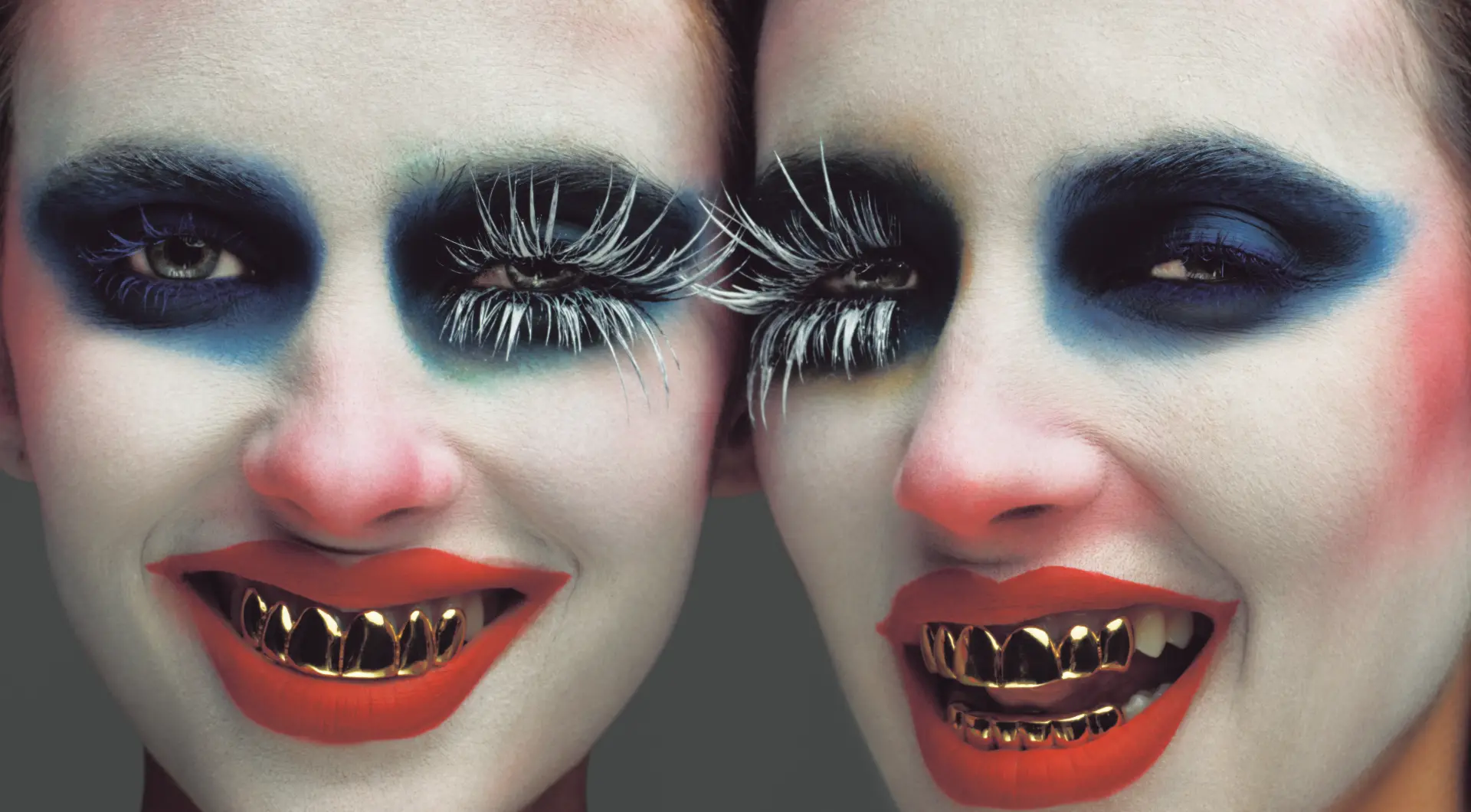 Herbert twins close-up portrait with gold grills and blue eye makeup