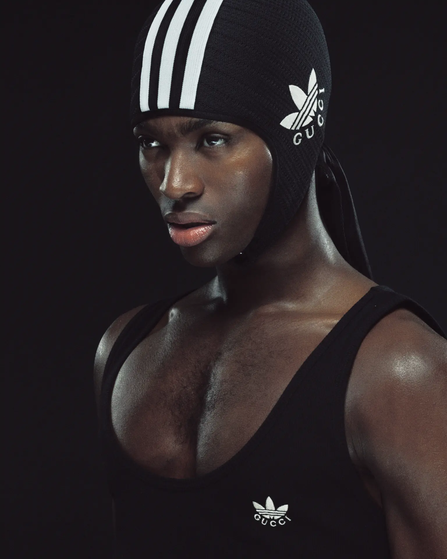 DUST Magazine — Alton Mason portrait in black Adidas x Gucci beanie and tank top