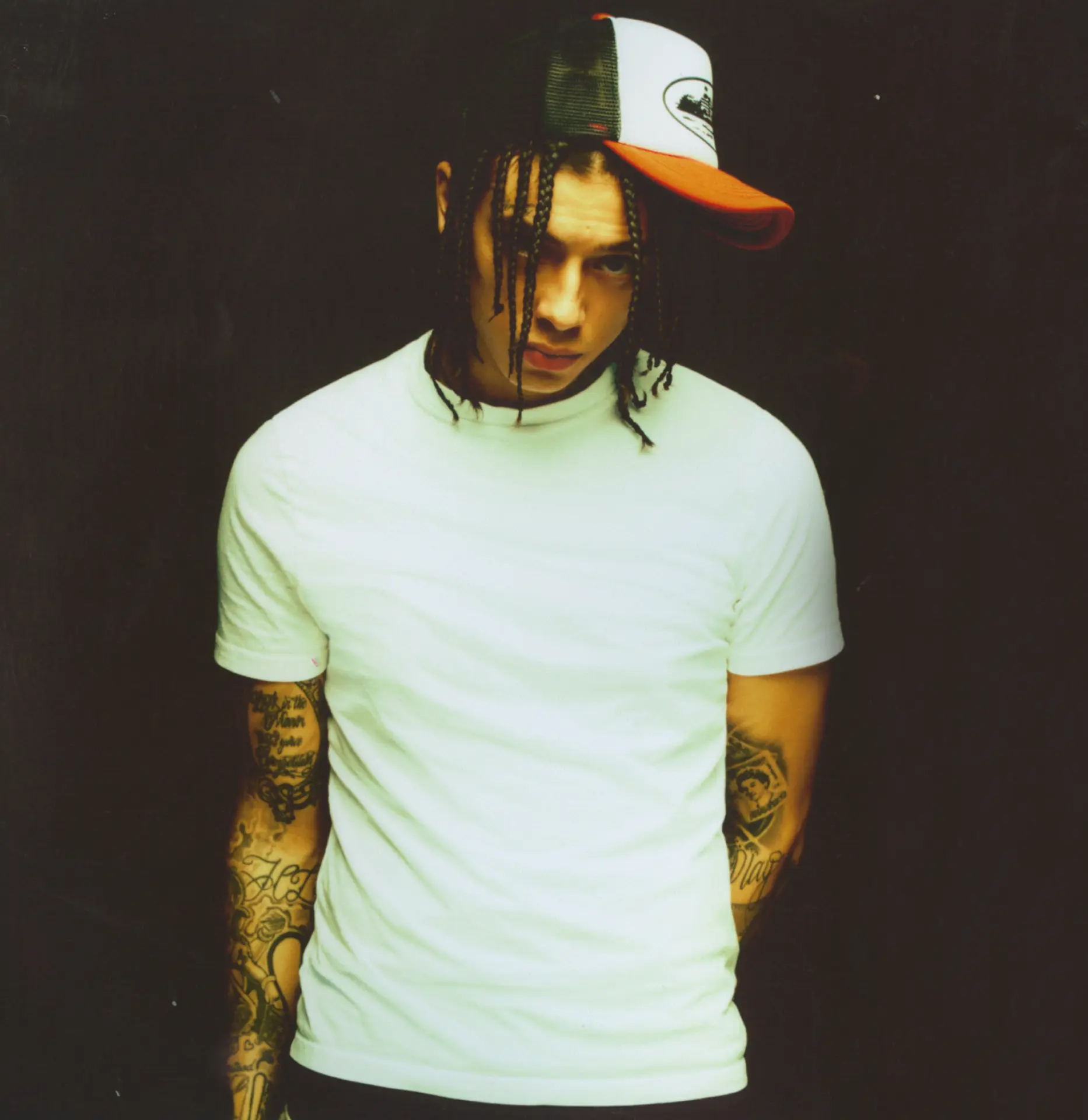Portrait in white t-shirt and trucker hat