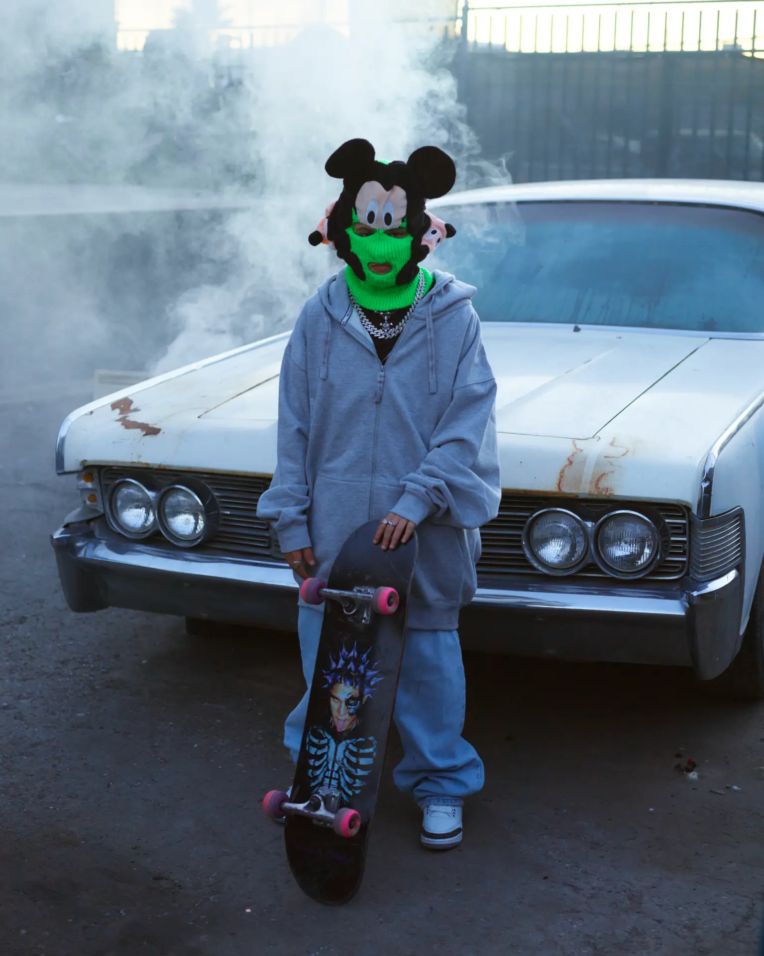 Skate mask portrait by a car