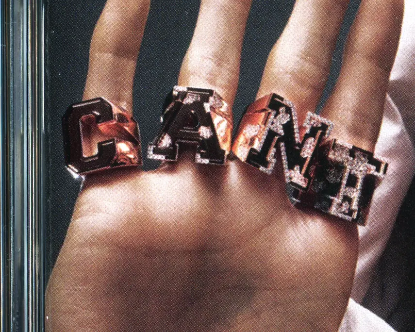 Central Cee — hand wearing iced CANT knuckle rings
