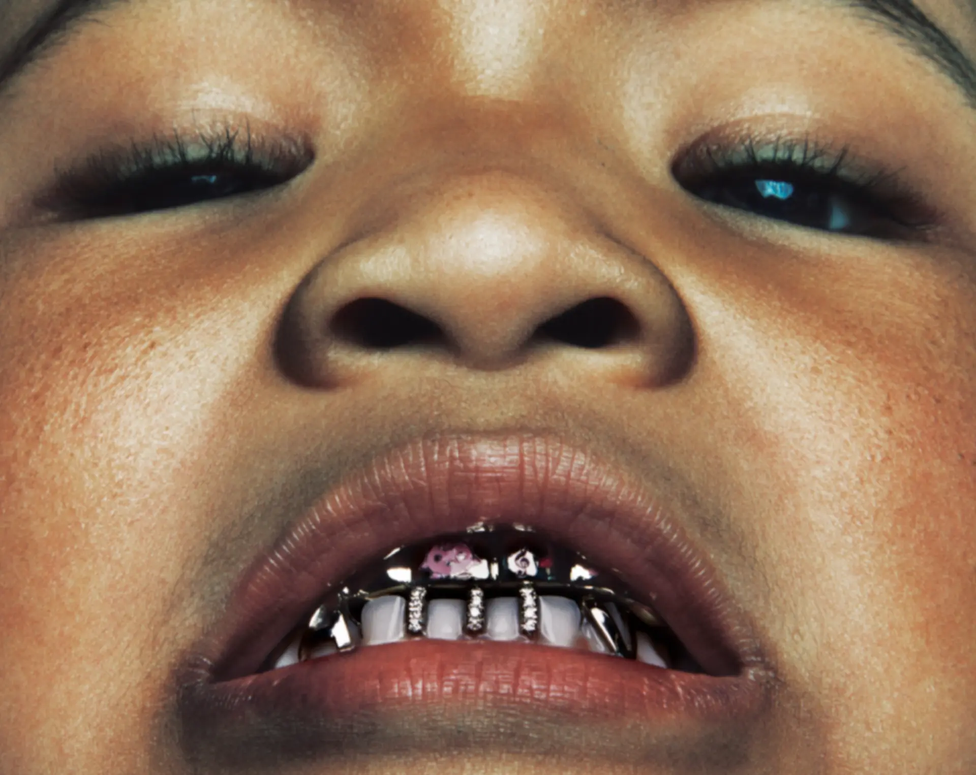 Mouth close-up with grill