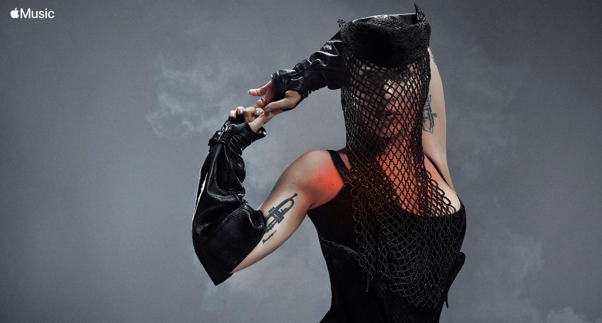Lady Gaga — Apple Music portrait in black mesh mask and leather gloves