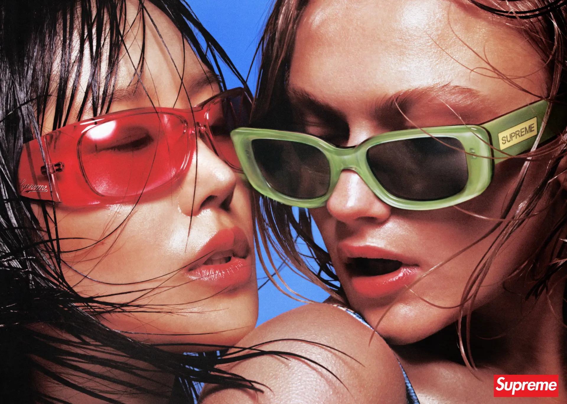 Supreme Eyewear — two faces in red and green sunglasses