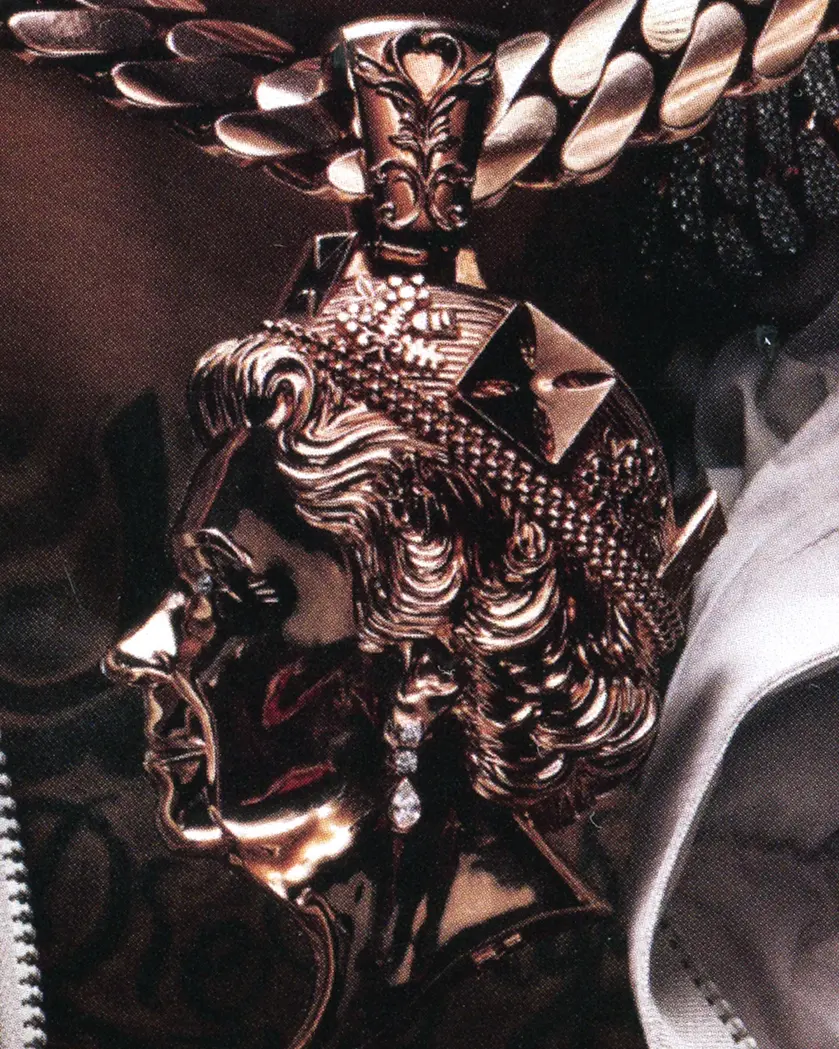 Central Cee — detailed gold pendant with cross and chain