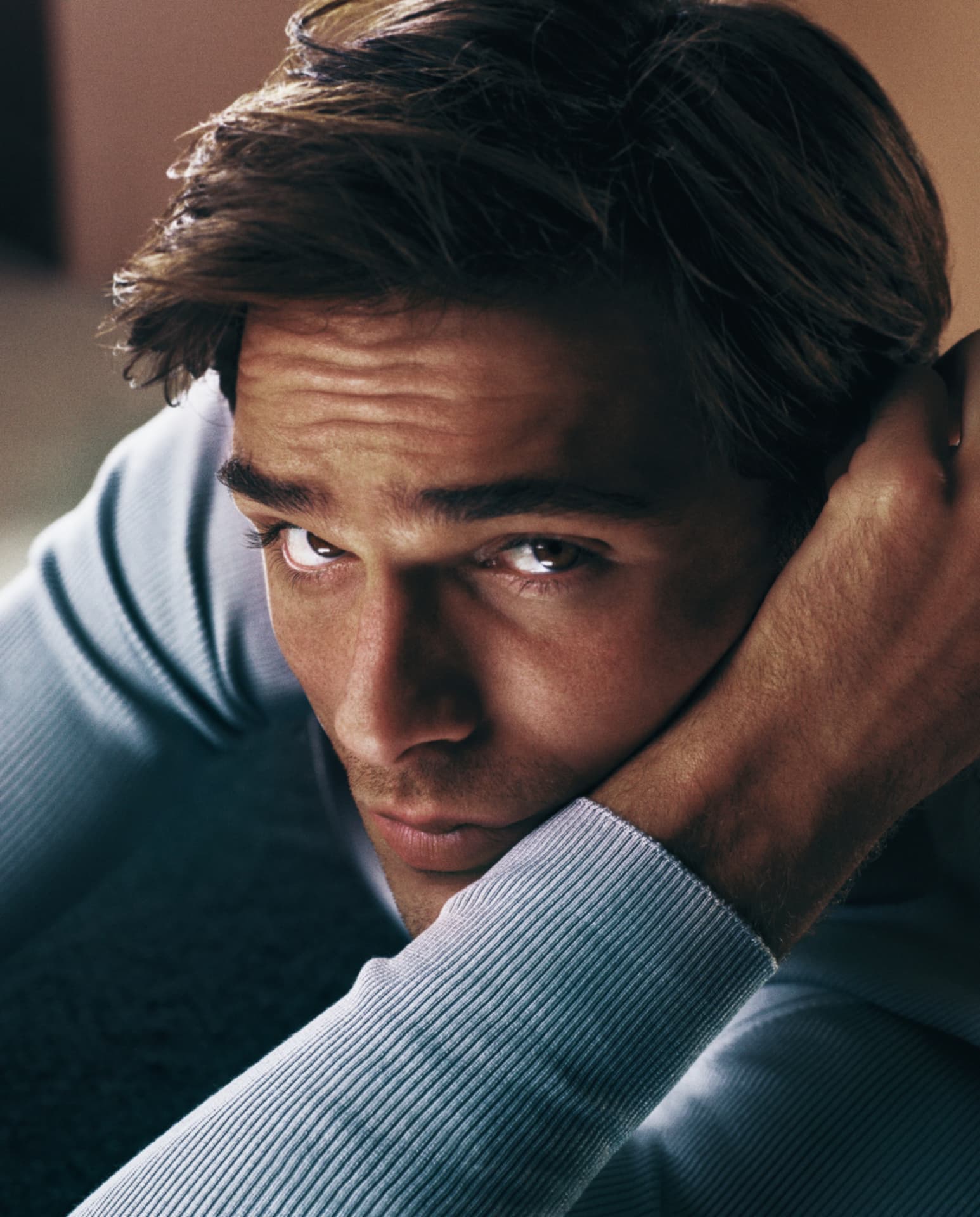 Jacob Elordi — close-up portrait in light blue hoodie