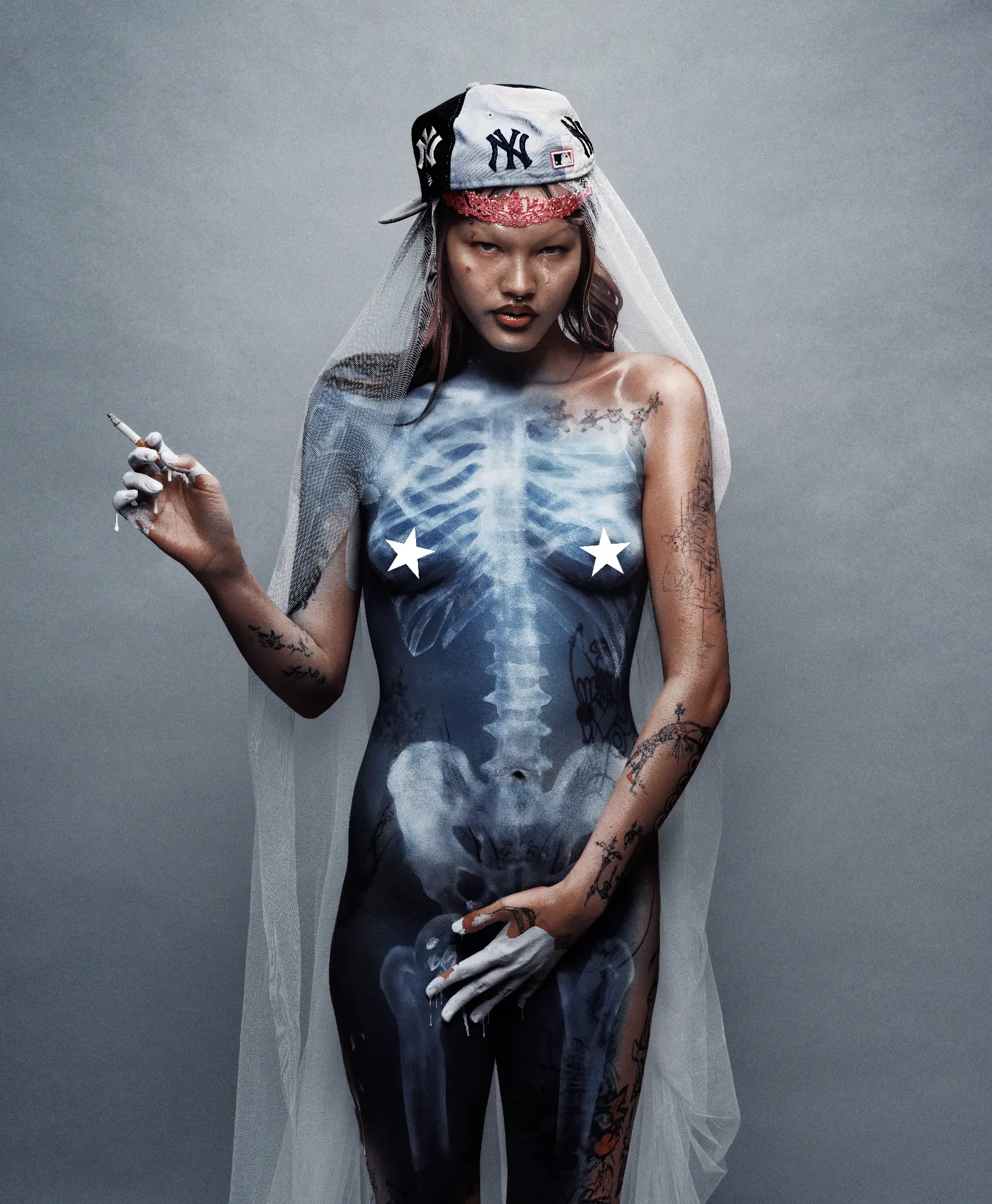 Saffron portrait with skeleton body paint, veil and Yankees cap holding a cigarette