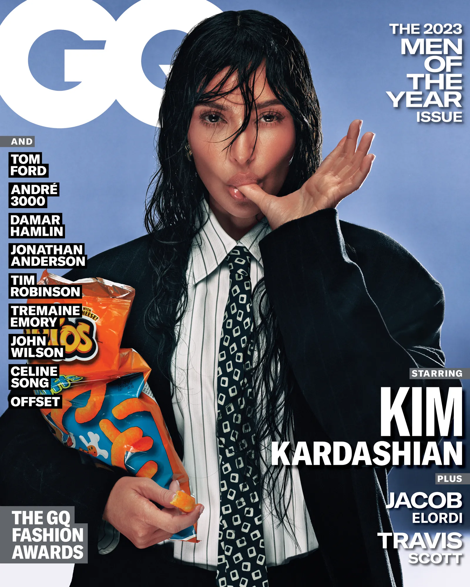 Kim Kardashian — GQ Men of the Year cover holding Cheetos