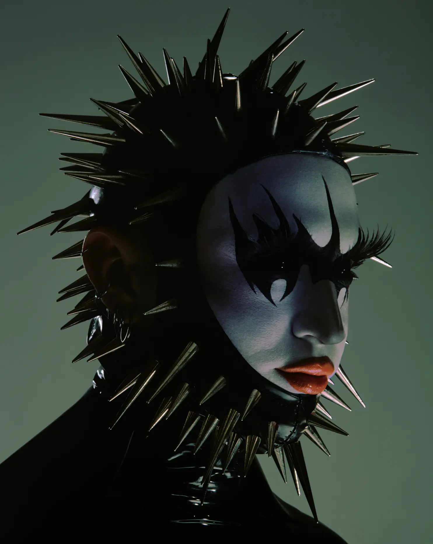 Spiked hair and dramatic black makeup portrait