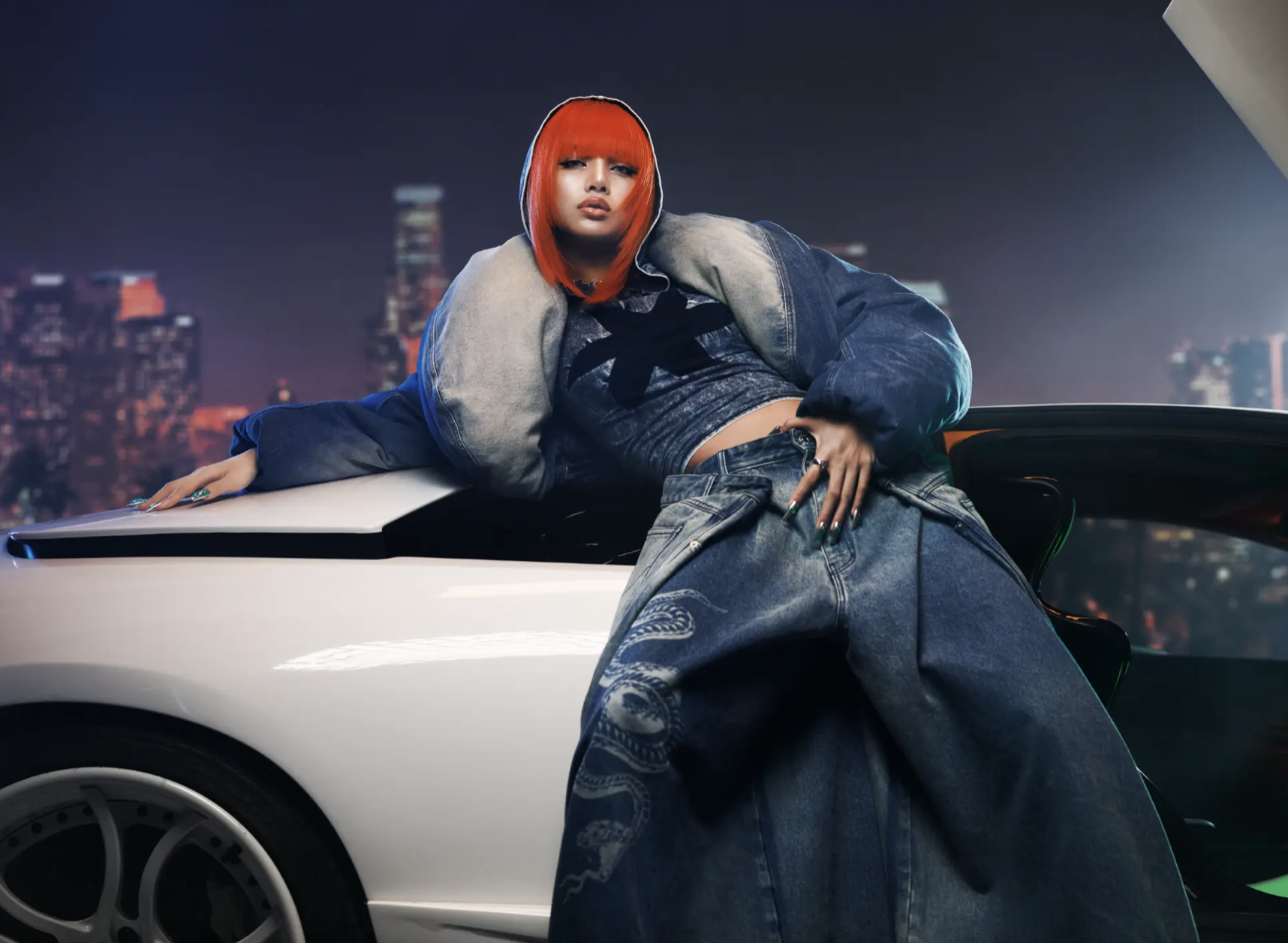 Lalisa — red-haired figure in denim on white car at night