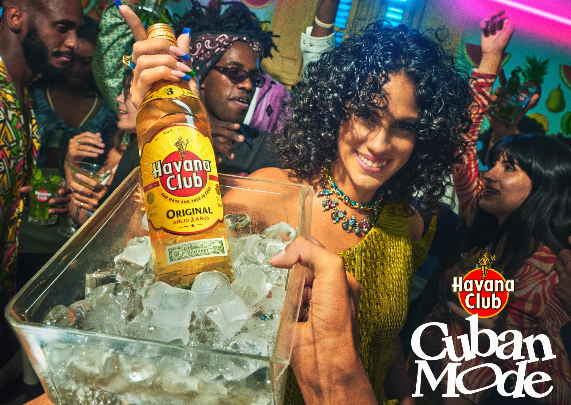 Havana Club — Cuban Mode party scene with bottle on ice and dancers
