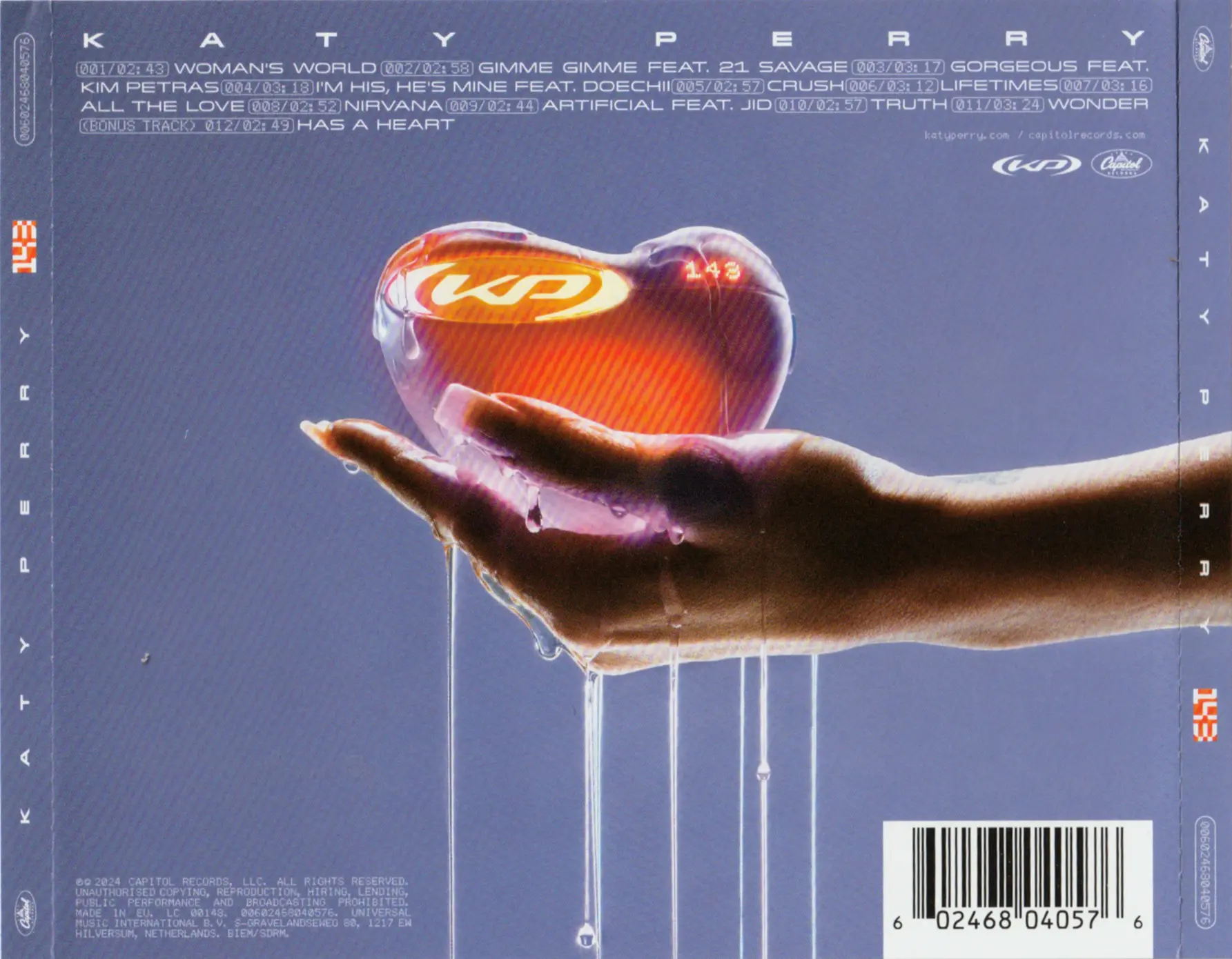 Katy Perry — 143 album back cover with hand holding a glowing heart