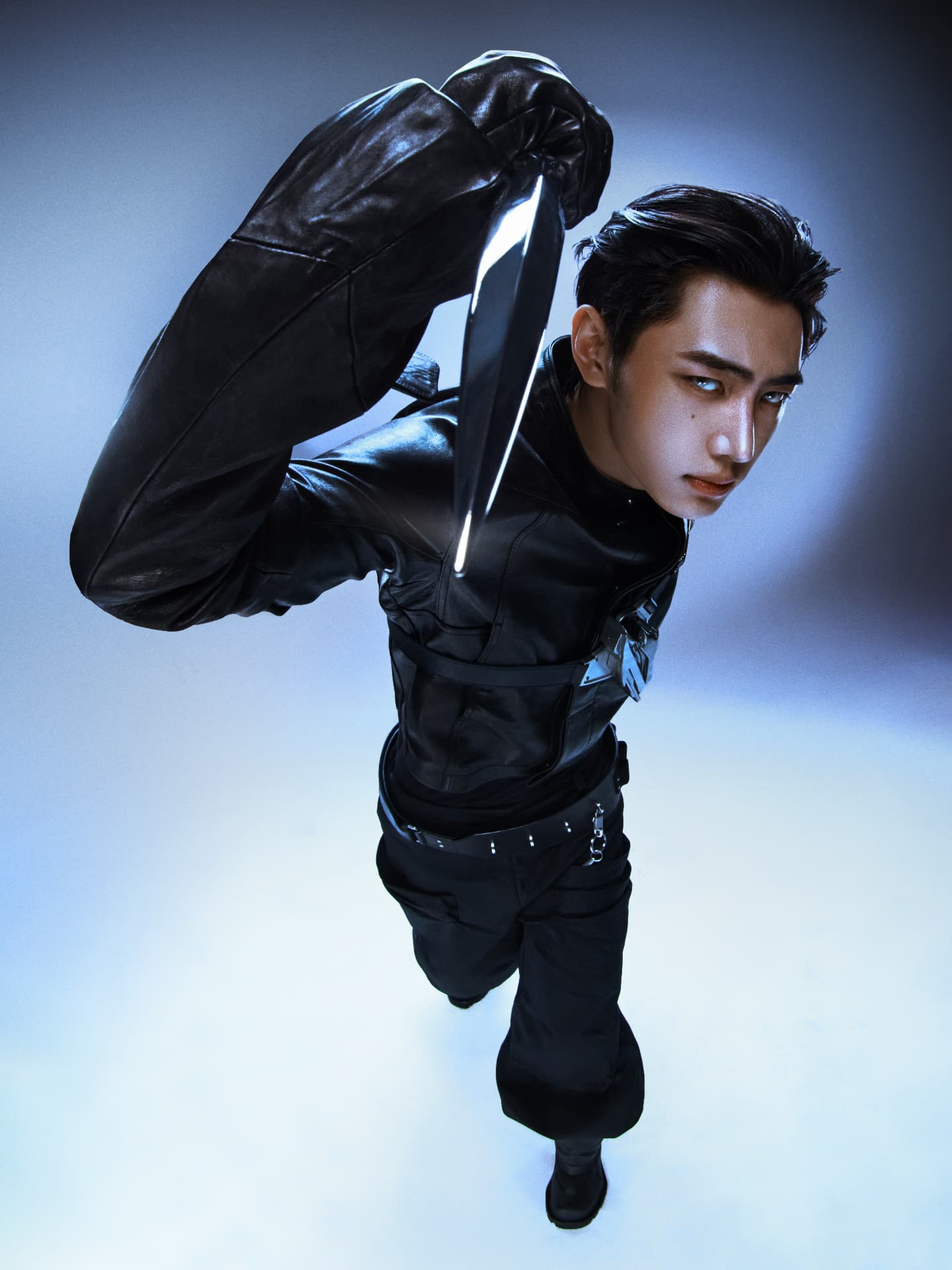 ENHYPEN — Sunghoon in black leather with arm raised